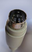 PS2_connector-black_male-_tilted_close_up_PNr°0061